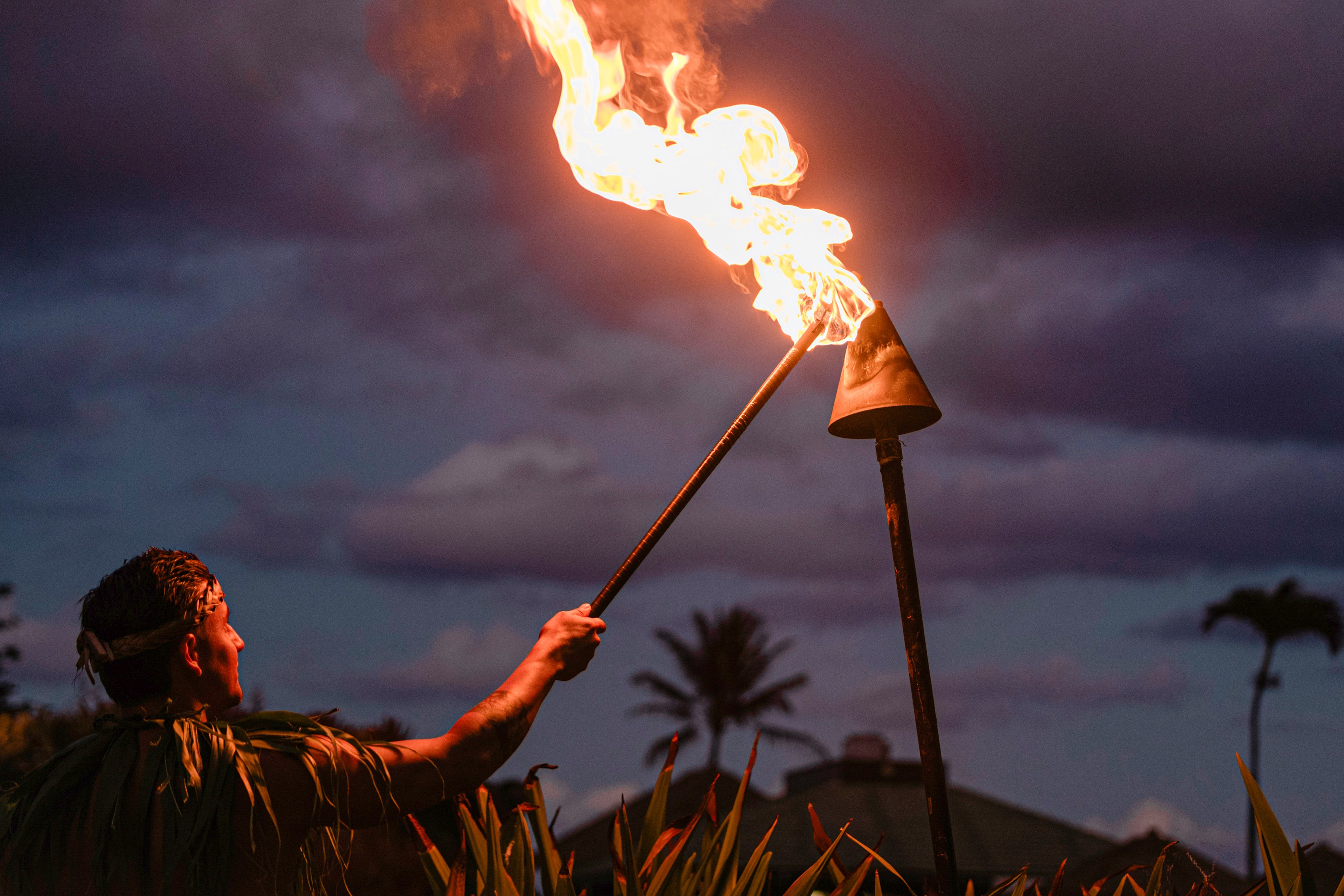 Fire Torch Lighting at OUTRIGGER Kauai Beach Resort & Spa
